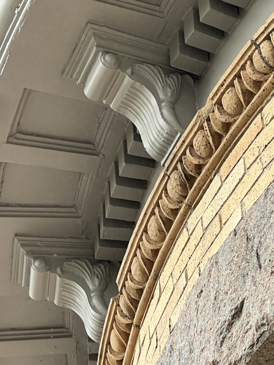 Terra cotta cornice and brick detail at the Cadwell House